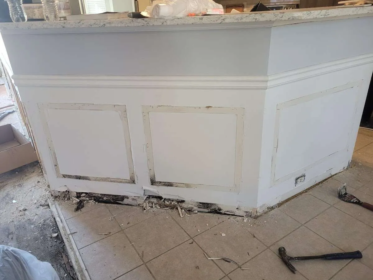 Water damage and mold on kitchen during Storm Damage Restoration in Gustine